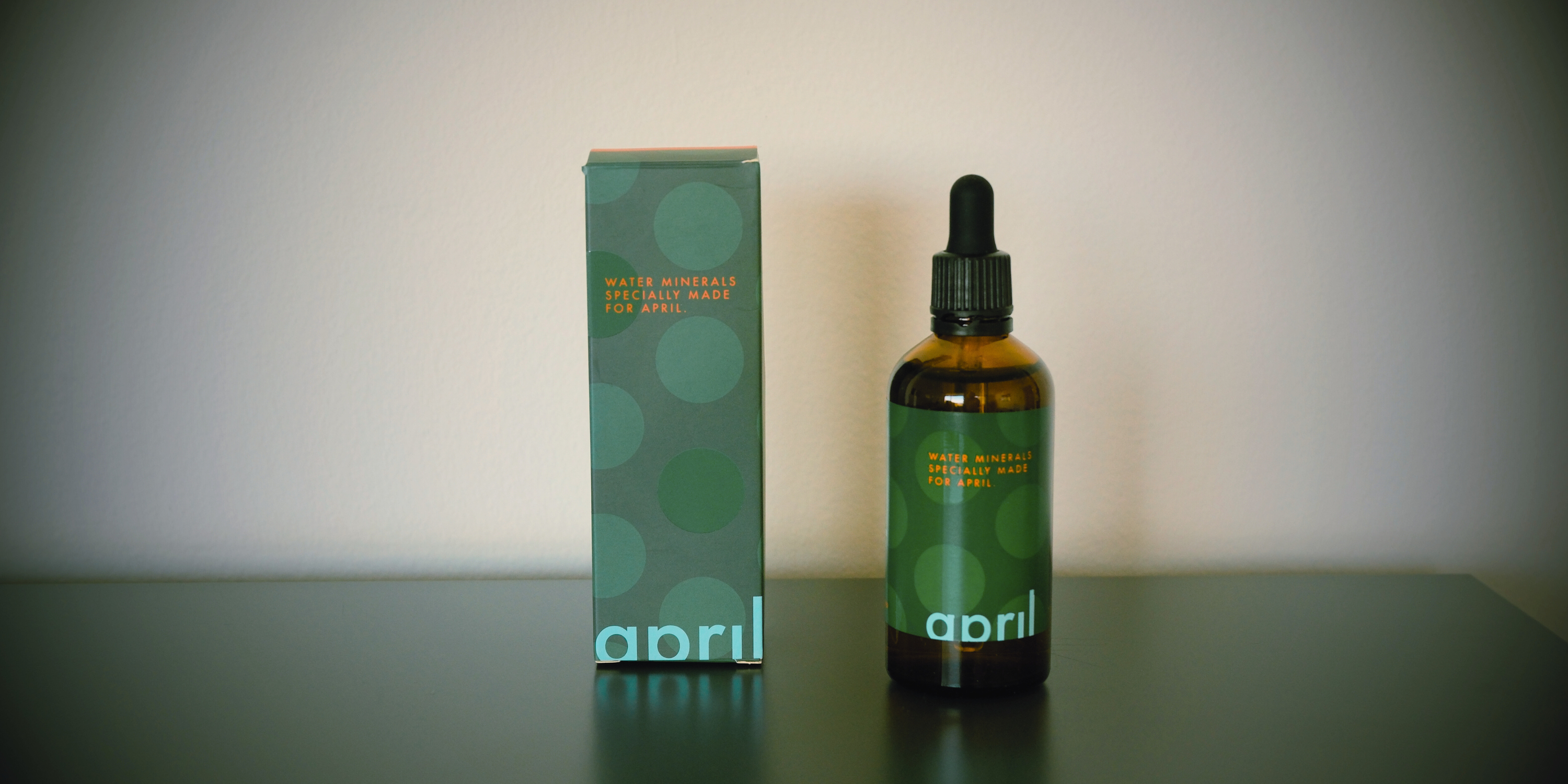 A bottle of April coffee roasters -mineral concentrate co-branded with APAX LAB