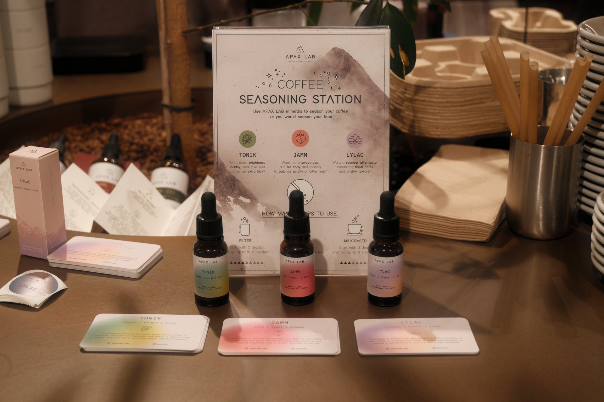 Coffee Seasoning station with APAX LAB bottles of mineral concentrates in a coffee shop